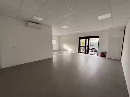 a louer - magasin avec atelier de 168m²
