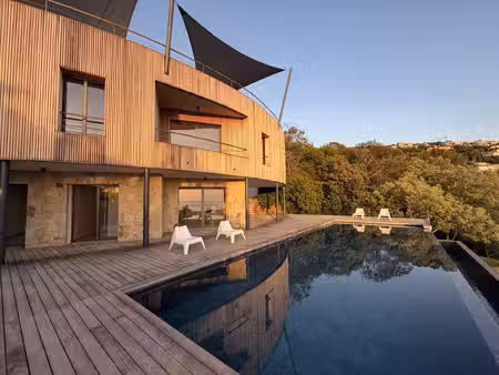 rive sud du golfe d'ajaccio - villa d'architecte vue mer avec piscine et sauna - 380m2