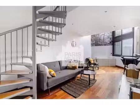 75017 - rue aumont thieville - 2/3 pieces meuble en duplex + vue tour eiffel