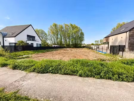 tertre — terrain à bâtir de 10 ares pour une maison 4 faç.