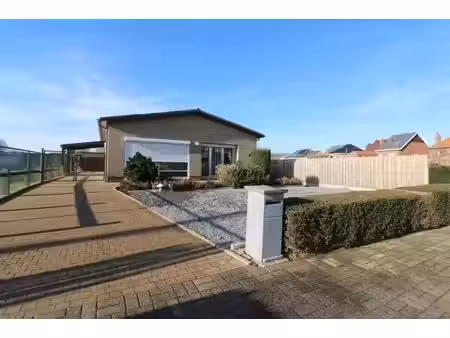 rustig gelegen gelijkvloerse woning met drie slaapkamers