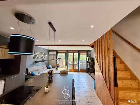 charmant duplex avec garage  terrasse et terrain