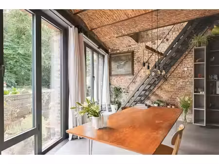 propriété historique rénovée au style loft industriel