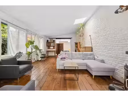 rez-de-chaussée 2 chambres de ± 126m² avec jardin