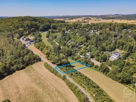 heure – superbe parcelle à bâtir de 10ares 50ca.