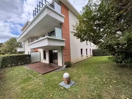 a louer - appartement f3 de 72.40m² avec terrasse  jardin  cave et parkings - mo