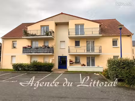 appartement t3 de 63 90 m² avec balcon et parking privatif
