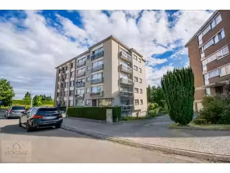 appartement de 2 chambres  emplacement de parking et cave