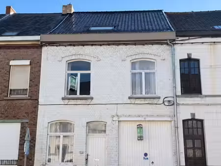 maison avec garage et jardin orienté au sud