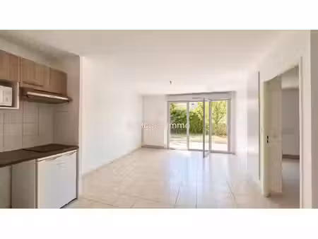 toulouse nord - appartement t2 de 42.59m² avec jardin et parking en sous-sol