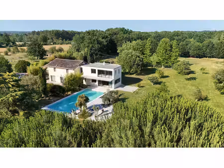 propriété d'exception avec extension contemporaine  parc arboré  piscine et potentiel doma
