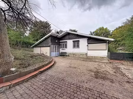 bungalow 3 ch. avec garage  parking et jardin
