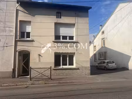 immeuble de rapport/ 3 apparetements + 2 garages 54360 bla