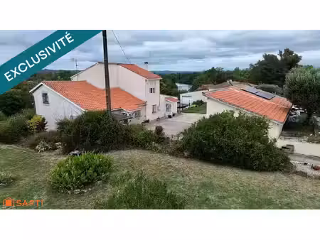 maison familiale avec dépendances  vaste terrain et vue dégagée sur le lot