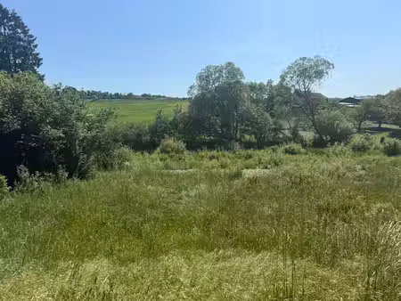 terrain à bâtir lot 1: cadre verdoyant et facile d'accès