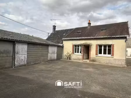 maison avec 500 m² de dépendances sur un terrain clos