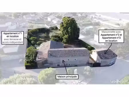 propriété de 332 m² comprenant 1 maison et 3 appartements loués
