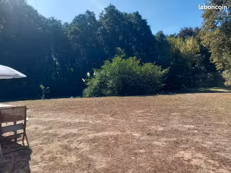 maison sur terrain constructible au nord est et sud est