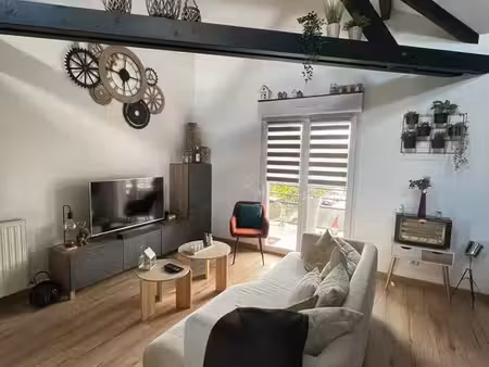 a vendre appartement de 100 m² avec balcon  garage  cave & mezzanine