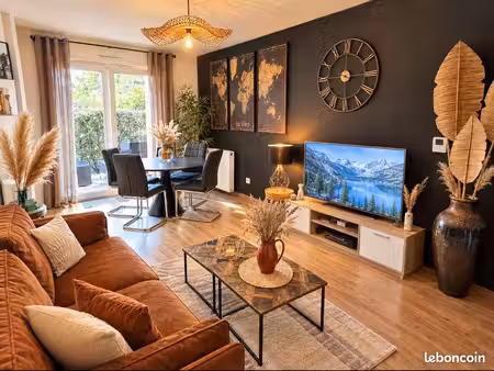 appartement t2 rénové avec jardin privatif de 51.60 m² et place de parking - résidence séc