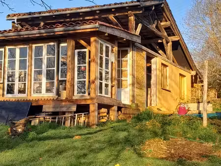 ecoconstruction en terre paille sur terrain arboré