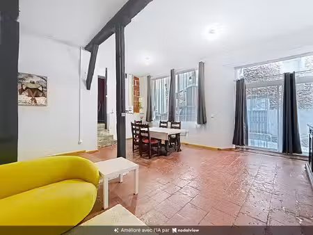 maison de ville de 126 m² avec garage  cour intérieure.