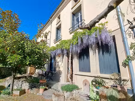 a vendre montsegur maison mitoyenne avec garage et studio au centre du village