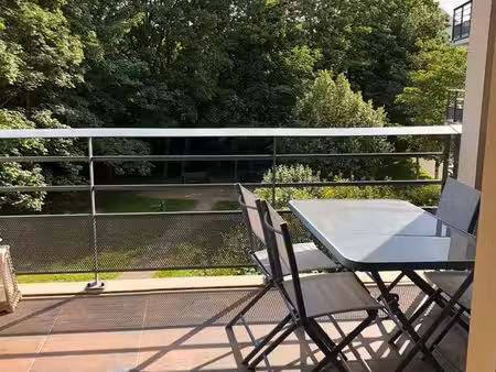 bel appartement de 66m2 + terrasse de 7m2 + garage fermé