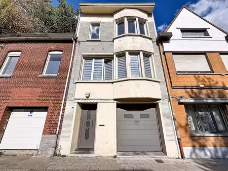 spacieuse habitation 4 chambres avec garage et jardin située