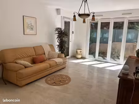 particulier - t3 69m2 avec jardin et terrasse couverte de 38m2