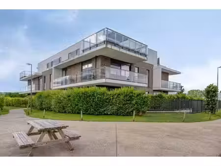 prachtig gelijkvloers appartement met 2 slks  zonneterras...