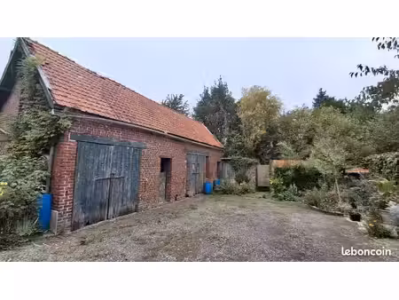 dépendances en brique et terrain 700m2  potentiel habitation