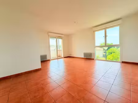 appartement de 66m2 avec terrasse et 2 places de parking - p