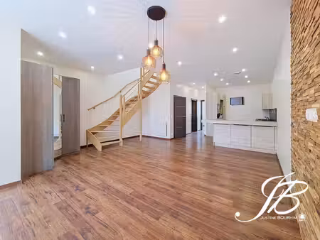 loft renove de 118m² avec terrasse et parking couvert