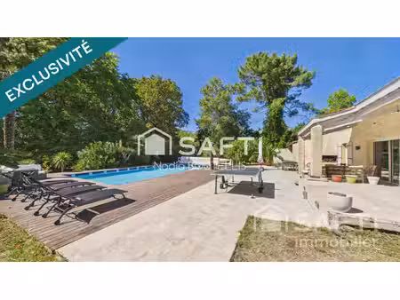 volumes généreux  3 suites parentales  5 chambres  piscine chauffée et superbe jardin arbo