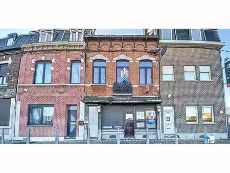 sous option - bien commercial à vendre à liège