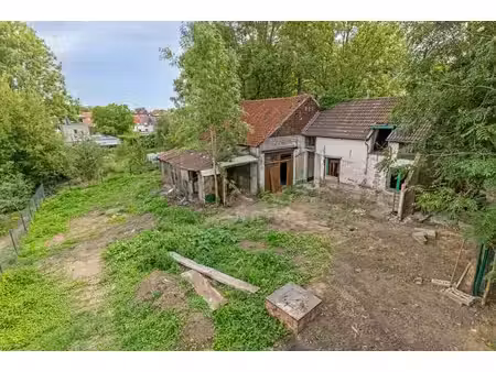 atelier + habitation sur terrain de 1.000 m² à réhabiliter