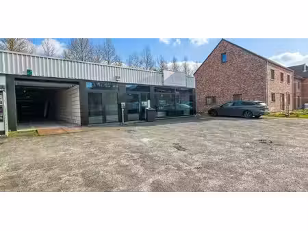 sous option - bien commercial à louer à huldenberg