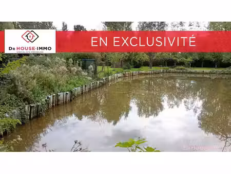 terrain de loisir avec parcelle d'étang
