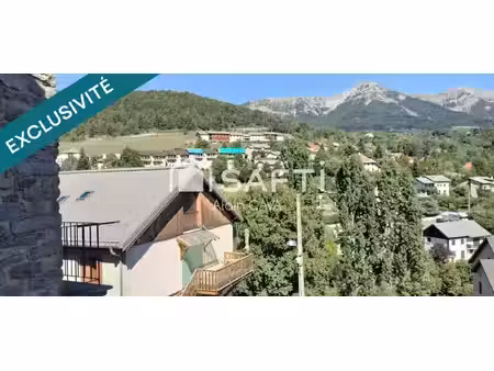 appartement de 73m² tranversant avec terrasse  local commercial  caves voutés  grenier