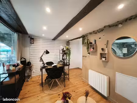 local commercial avec vitrine  sous arcades