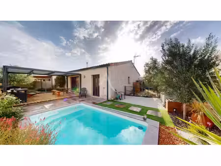 maison plain pied avec jardin garage et piscine a conque sur orbiel
