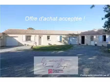 ensemble immobilier de 2 maisons louées avec garages et jardins