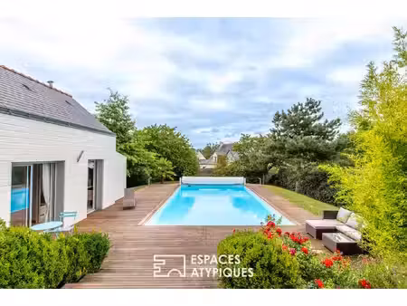 maison contemporaine dans un havre de paix avec piscine extérieure