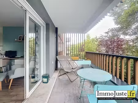 appartement t4 de 77m2  balcon  2 parkings et une cave