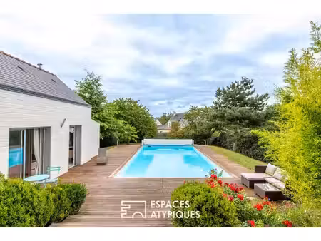 maison contemporaine dans un havre de paix avec piscine extérieure