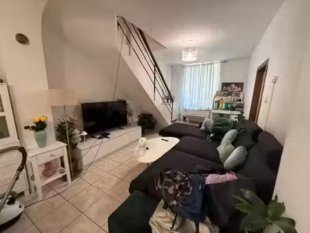 un immeuble de rapport comprenant 2 duplex de 2 chambres + 1