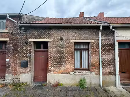 maison à rénover avec garage – beau potentiel