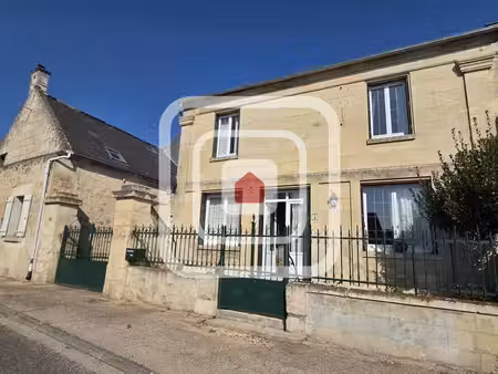 propriété comprenant 2 maisons