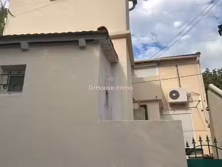 charmante maison de ville mitoyenne de 4 pièces avec terrasse proche centre ville d'alès.